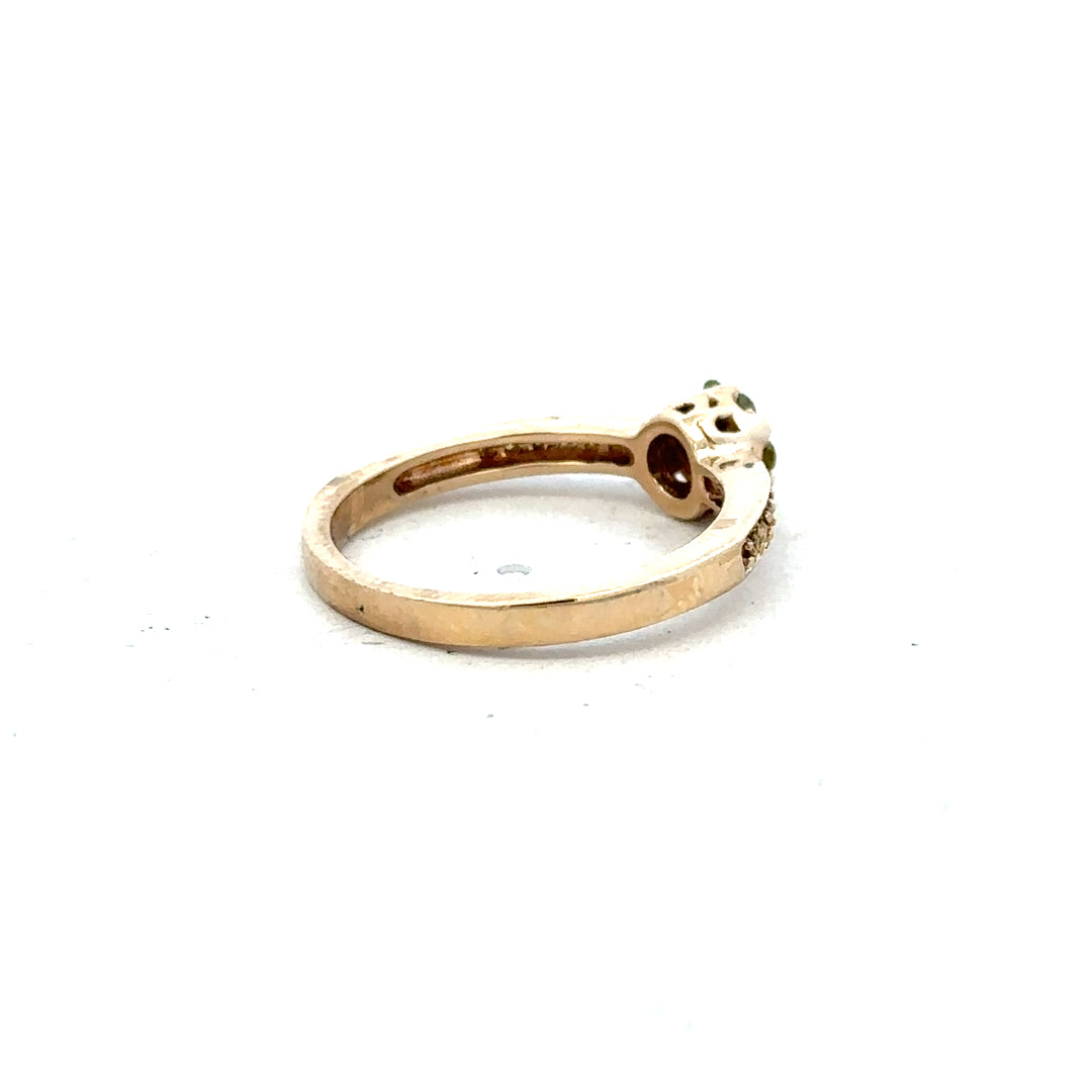 9ct yellow gold ring size N with a smooth band, unbranded, shown in a close-up image highlighting its polished finish.
