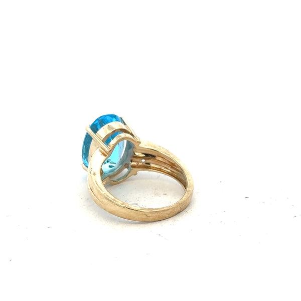 9ct yellow gold ring in size N with a smooth band, unbranded, shown from a side angle with a polished finish.