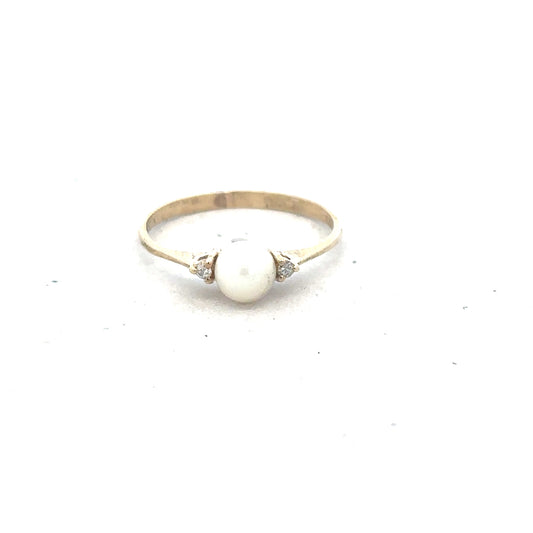 9ct yellow gold ring in size N with a smooth band, unbranded jewelry piece, showcasing a polished finish.
