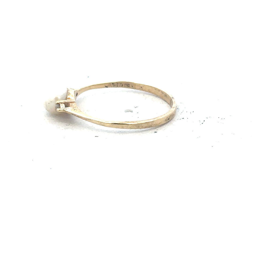 9ct yellow gold ring in size N with a smooth, polished finish, showcasing its elegant and classic design.