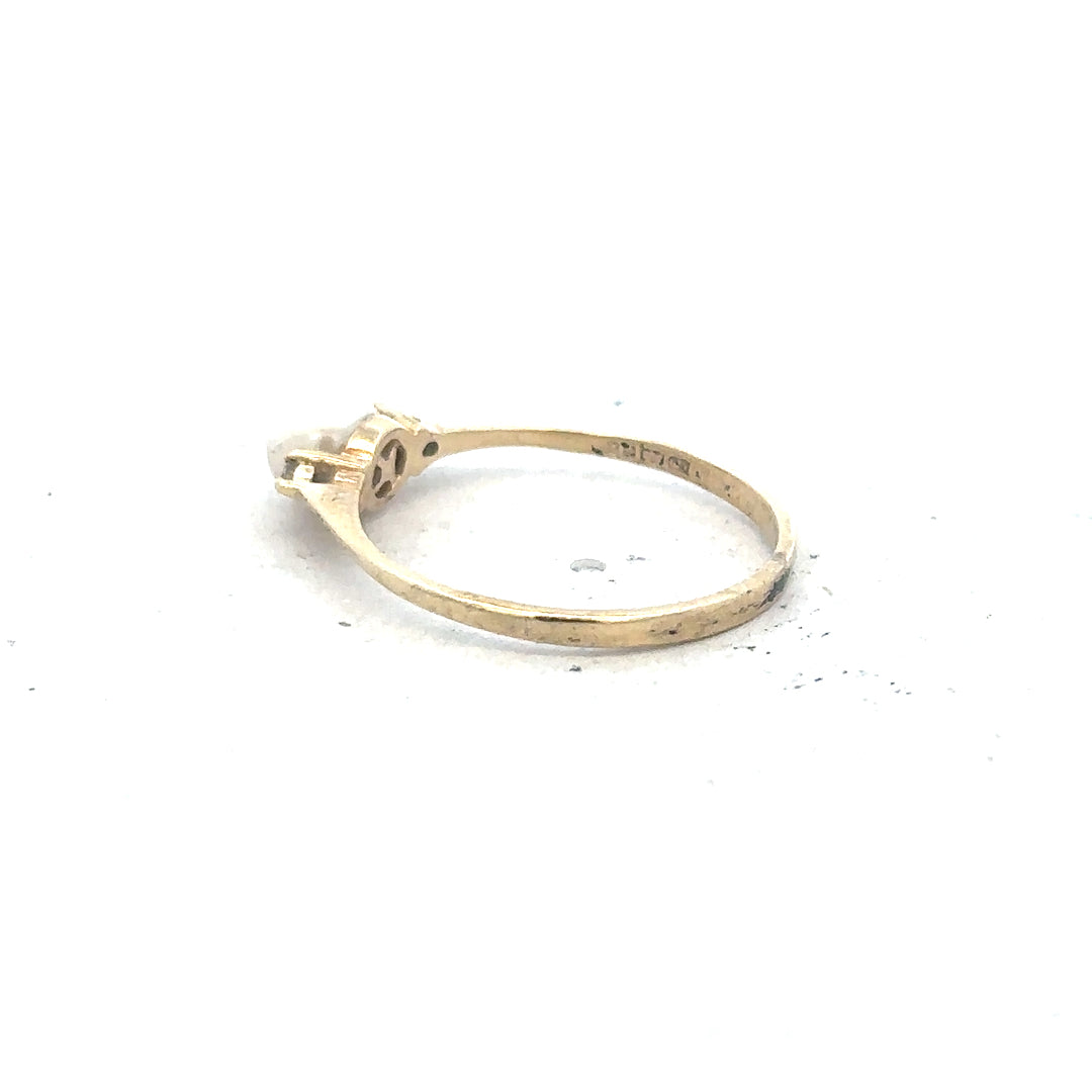 9ct yellow gold ring in size N with a simple band, unbranded jewelry, showcasing a polished gold finish and smooth design.