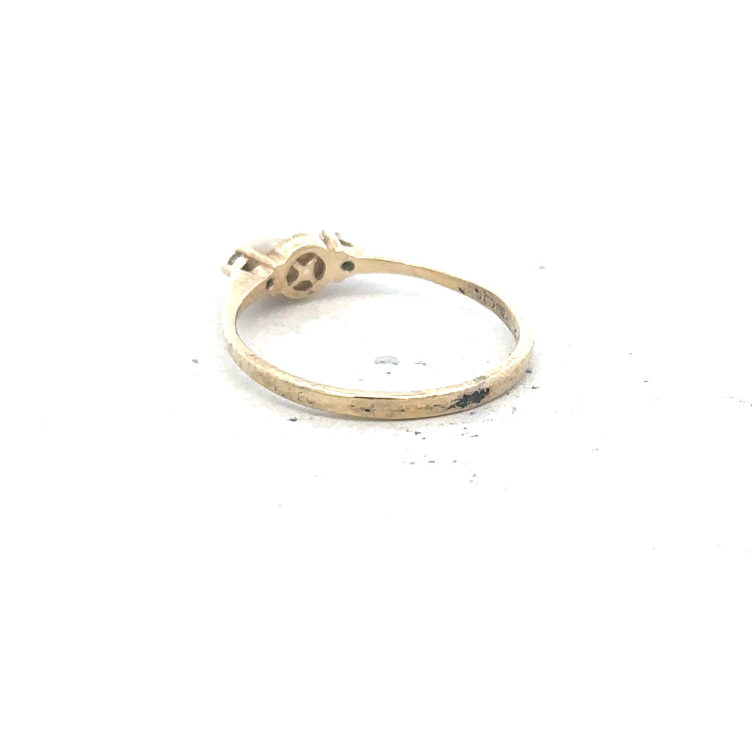 9ct yellow gold ring size N, unbranded, showcasing a smooth, polished band with a shiny finish.