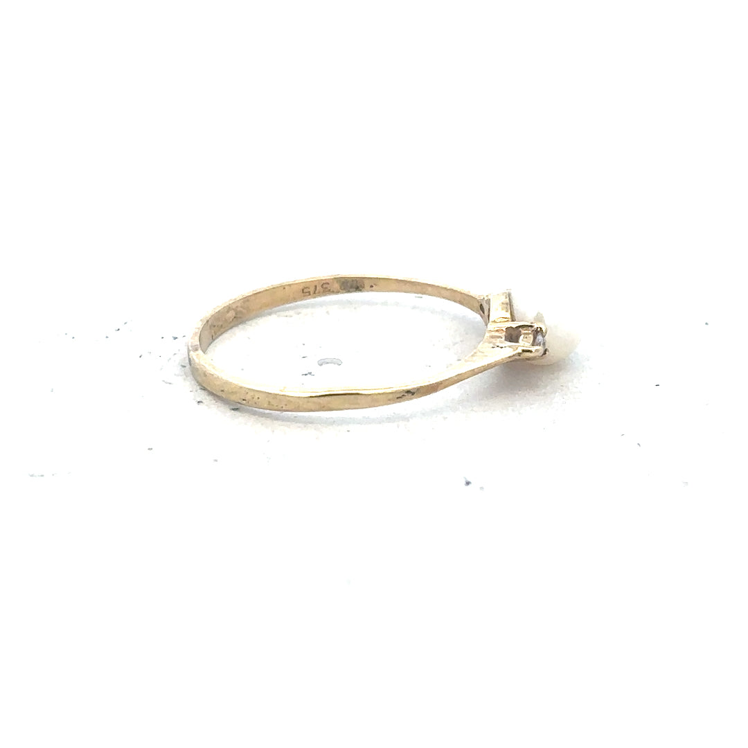 9ct yellow gold ring in size N with a simple, smooth band, unbranded jewelry showcasing elegant yellow gold craftsmanship.