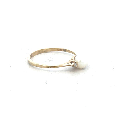 9ct yellow gold ring size N, elegant unbranded jewelry with a smooth band, showcased in a close-up image.