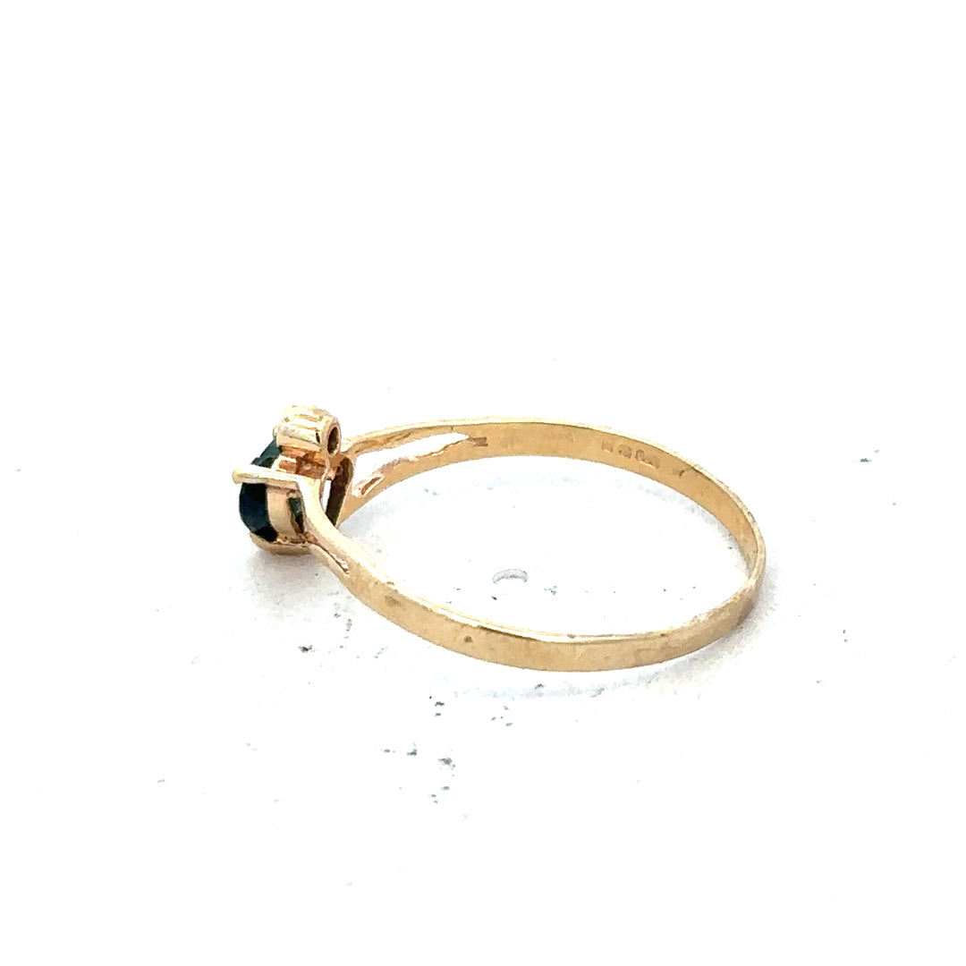 9ct yellow gold ring size N1/2 with a simple band design, unbranded jewelry displayed against a neutral background.