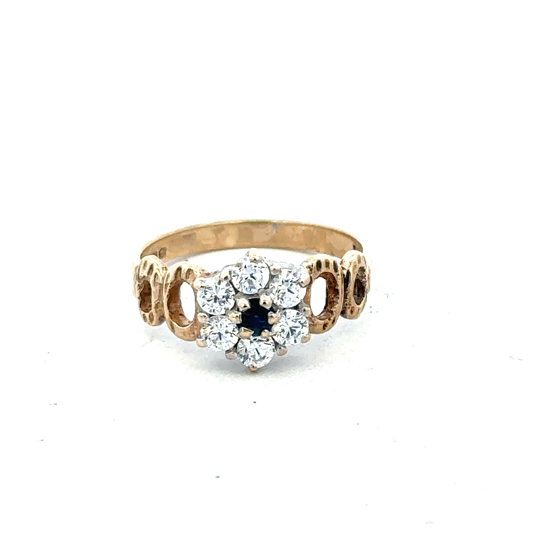 9ct yellow gold ring in size O with a smooth band, unbranded jewelry piece displayed on a plain background.