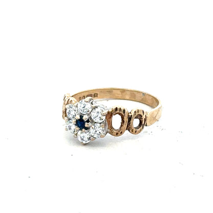 9ct yellow gold ring in size O with a smooth polished finish, unbranded jewelry, shown from a side angle.
