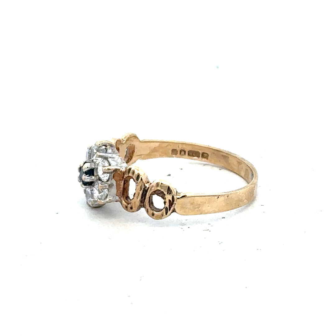 9ct yellow gold ring in size O with a smooth band, unbranded, shown in a close-up image highlighting its polished finish.