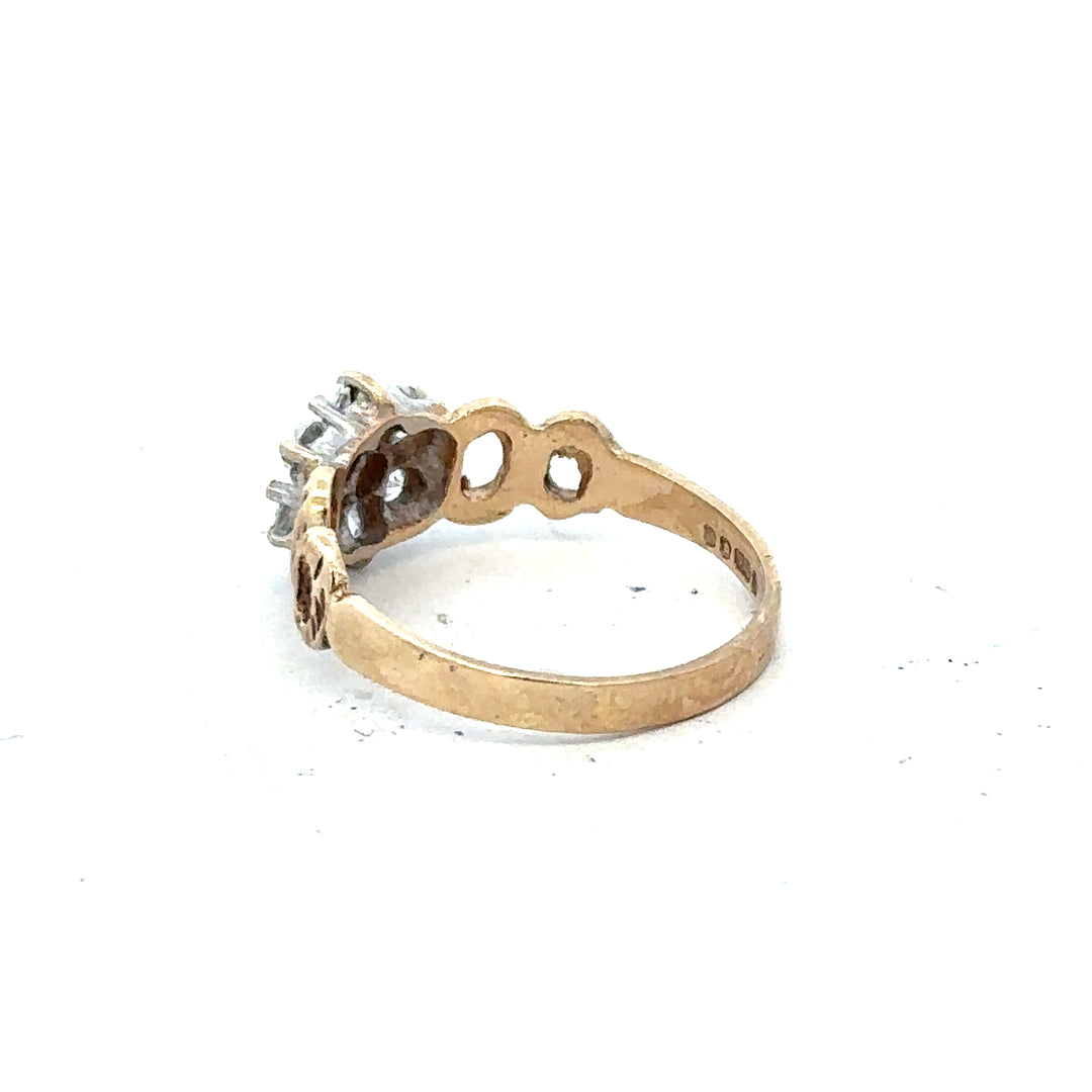 9ct yellow gold ring in size O with a smooth polished finish, unbranded jewelry, shown from a side view.