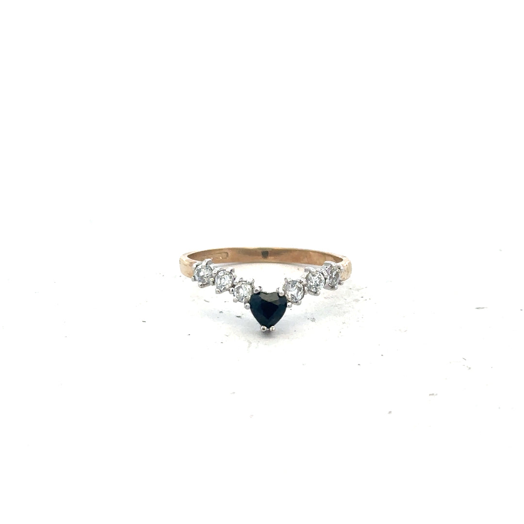 9ct yellow gold ring in size O, unbranded, showcasing a smooth polished band with a subtle shine.