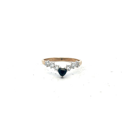 9ct yellow gold ring in size O, unbranded, showcasing a smooth polished band with a subtle shine.
