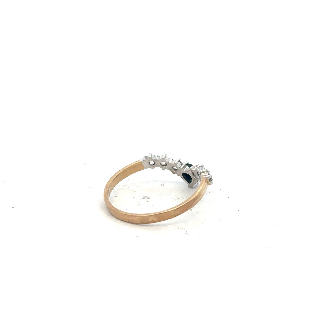 9ct yellow gold ring in size O, unbranded, showcasing a smooth polished band with a subtle shine.