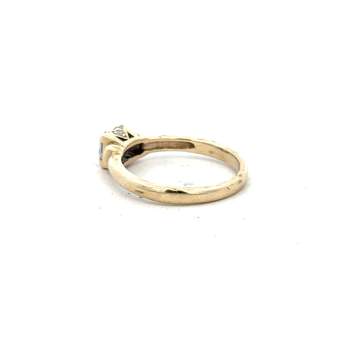 9ct yellow gold ring in size O, unbranded, with a smooth polished finish, shown close-up on a plain background.