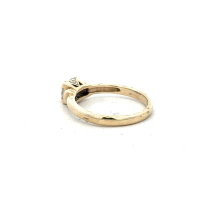 9ct yellow gold ring in size O, unbranded, with a smooth polished finish, shown close-up on a plain background.
