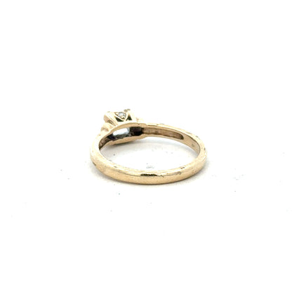9ct yellow gold ring in size O with a simple, polished band, unbranded, showcasing a classic jewelry design.