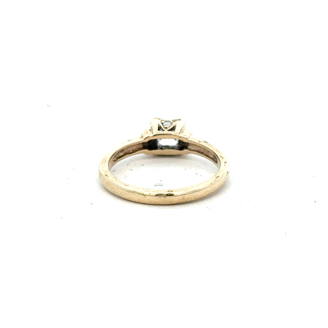 9ct yellow gold ring in size O, featuring a smooth band design, unbranded jewelry piece with a polished finish.