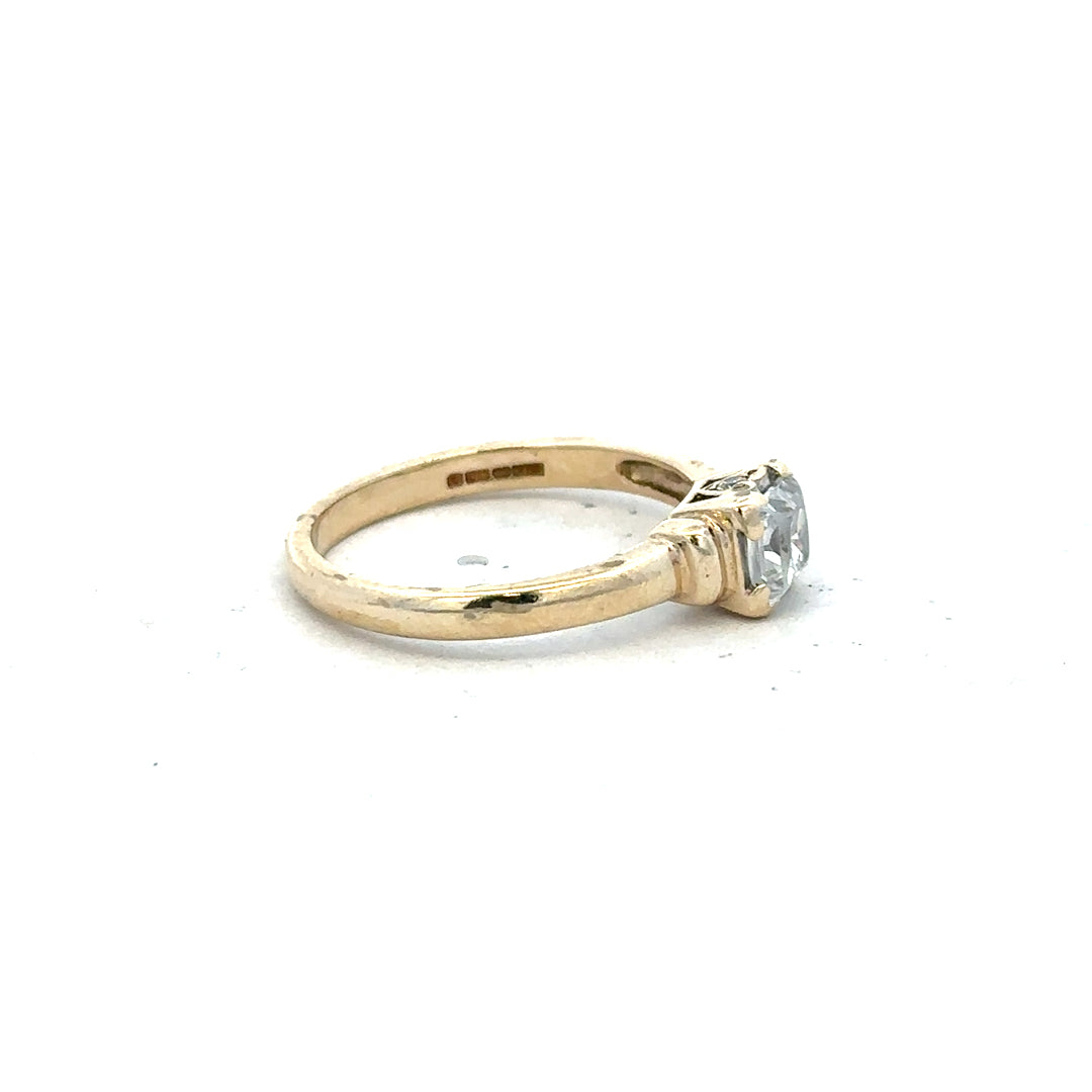 9ct yellow gold ring in size O with a smooth band, unbranded, featuring a polished finish and classic design.