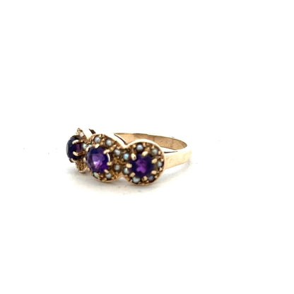 9ct yellow gold ring in size O with a smooth band, unbranded, shown from a side angle highlighting its polished finish.