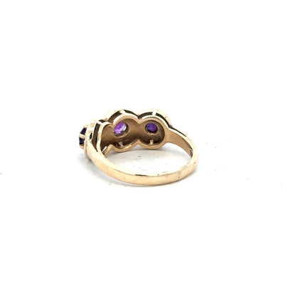 Gold ring in size O made of 9ct yellow gold, featuring a simple, polished band with a smooth finish.