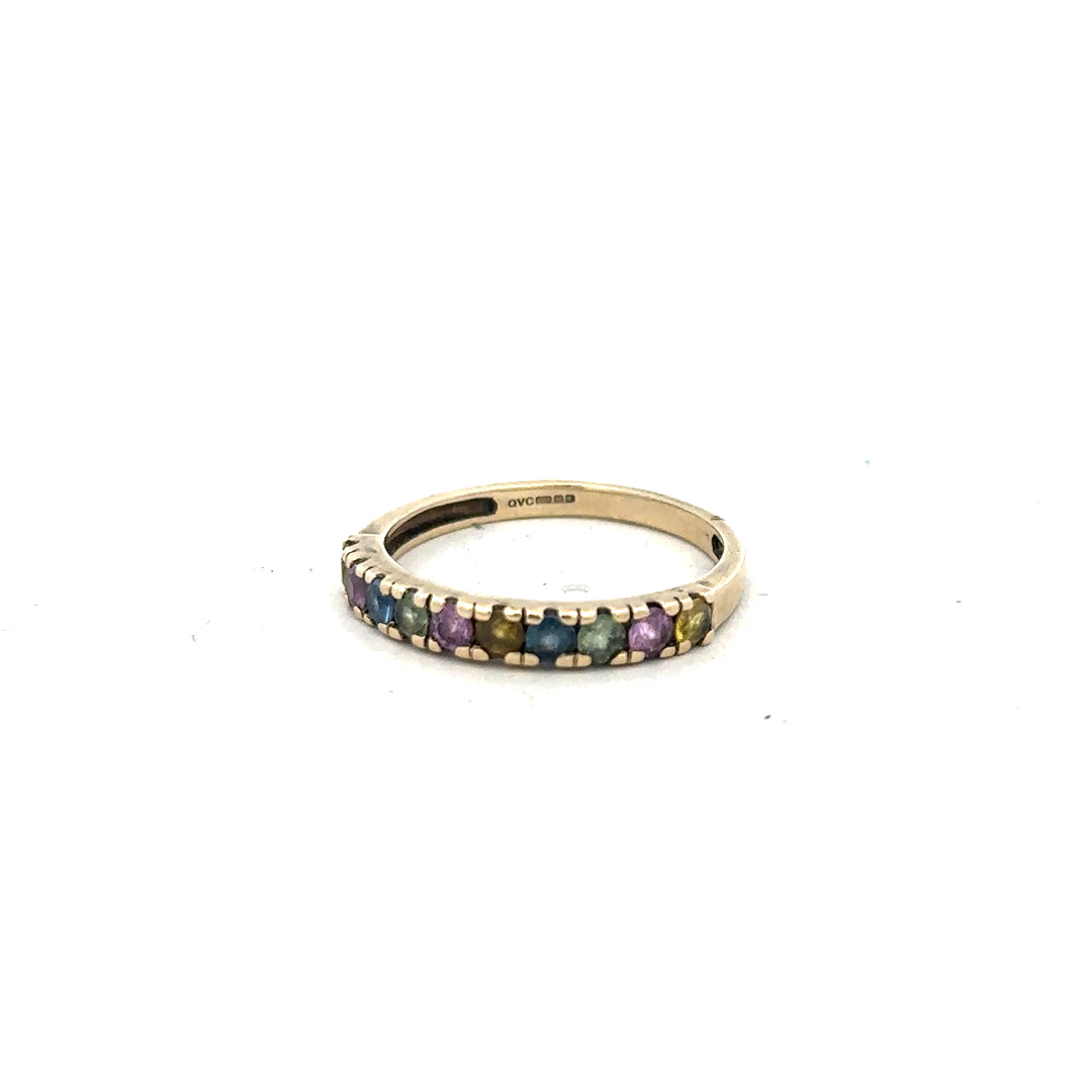 9ct yellow gold ring in size O, featuring a smooth band design, unbranded jewelry displayed on a plain background.