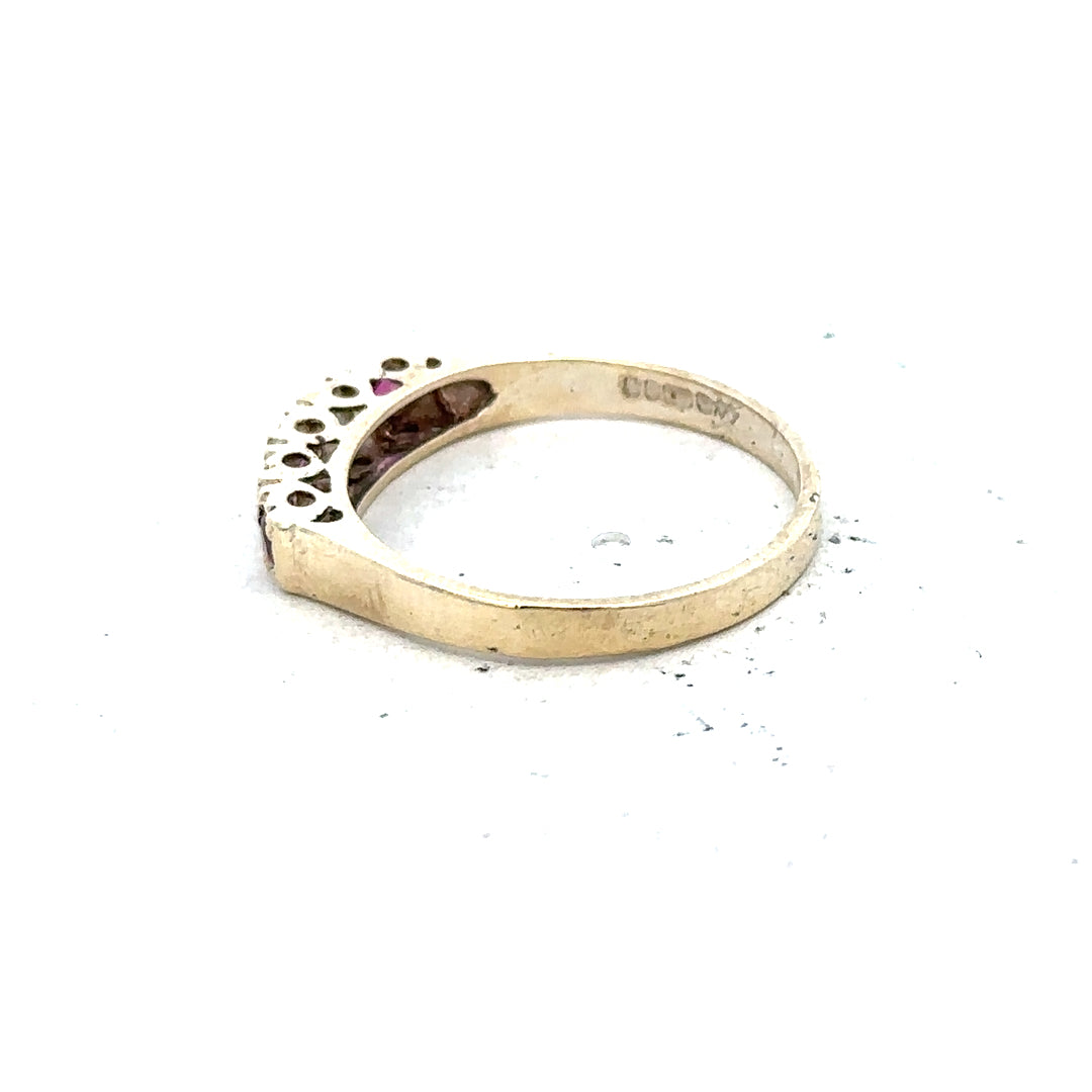 9ct yellow gold ring in size O with a smooth polished finish, unbranded jewelry displayed on a plain background.