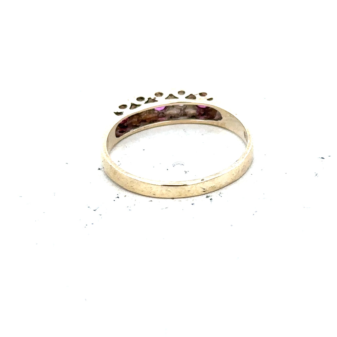 9ct yellow gold ring in size O with a smooth band, unbranded, showcasing a polished, classic jewelry design.