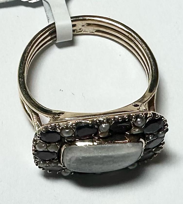 9ct yellow gold ring size O1/2 with smooth band, unbranded jewelry piece, shown in a close-up image.