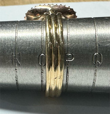 9ct yellow gold ring in size O1/2 with a smooth band, unbranded jewelry, featuring a polished finish.