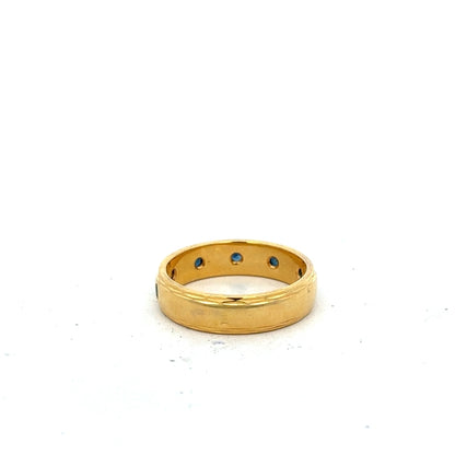 9ct yellow gold ring size O1/2 with a smooth band, unbranded jewelry piece displayed on a plain background.