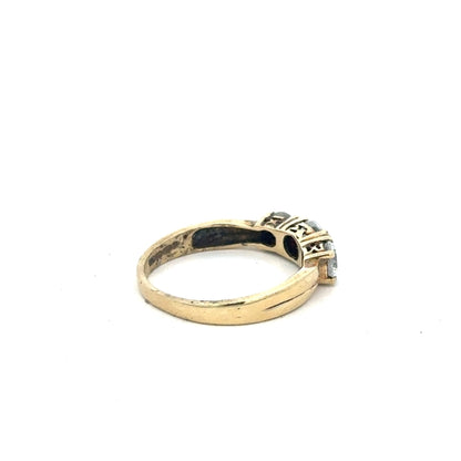 9ct yellow gold ring in size O1/2, unbranded jewelry with a smooth band, shown on a plain background.