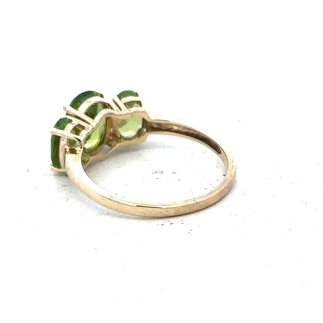9ct yellow gold ring in size P, unbranded, showing a polished band with smooth edges and a shiny finish.