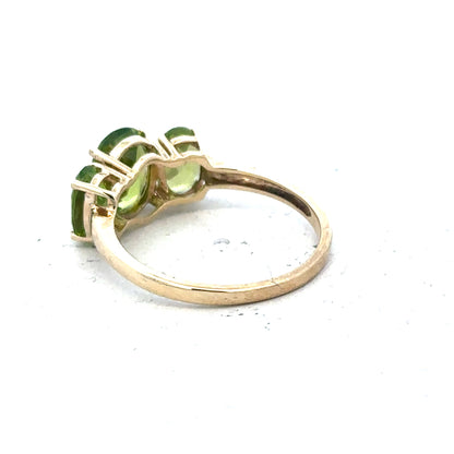 9ct yellow gold ring in size P, unbranded, showing a polished band with smooth edges and a shiny finish.