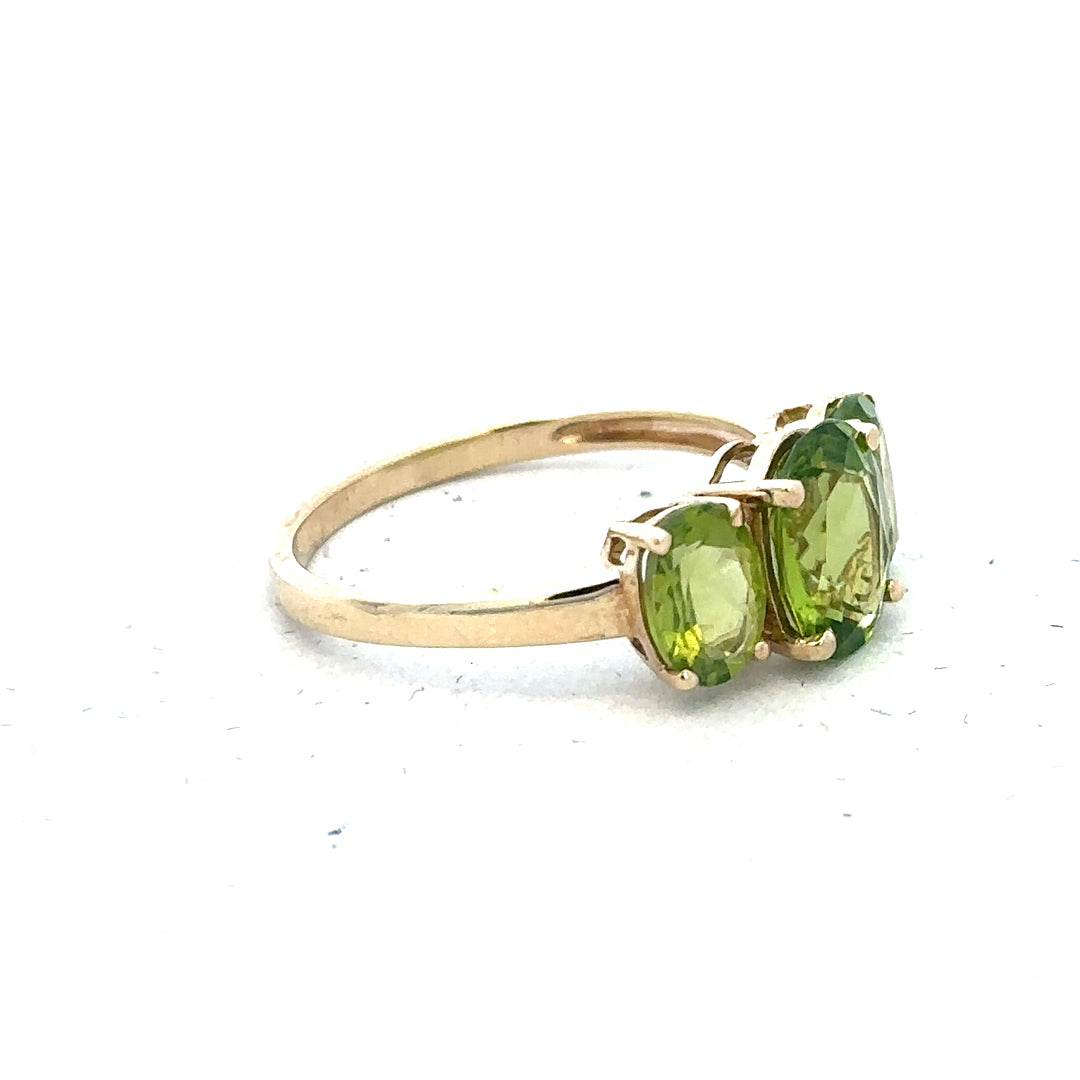 9ct yellow gold ring size P with smooth band, unbranded jewelry piece displayed against a neutral background.