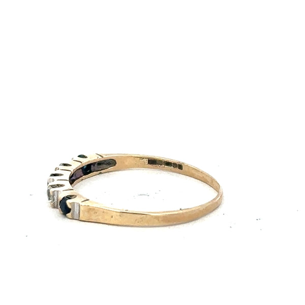 9ct yellow gold ring in size P with a simple band design, unbranded jewelry displayed against a neutral background.