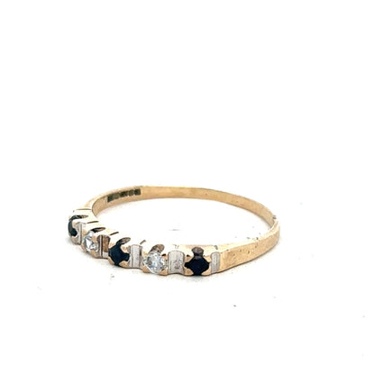 Yellow gold ring in size P with a smooth band, unbranded 9ct gold jewelry, displayed on a plain background.