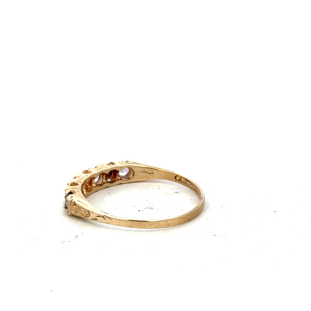 9ct yellow gold ring size P with a smooth, polished finish, showcasing a classic and elegant design.