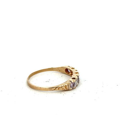 9ct yellow gold ring in size P with a smooth band, unbranded jewelry piece visible in the image.