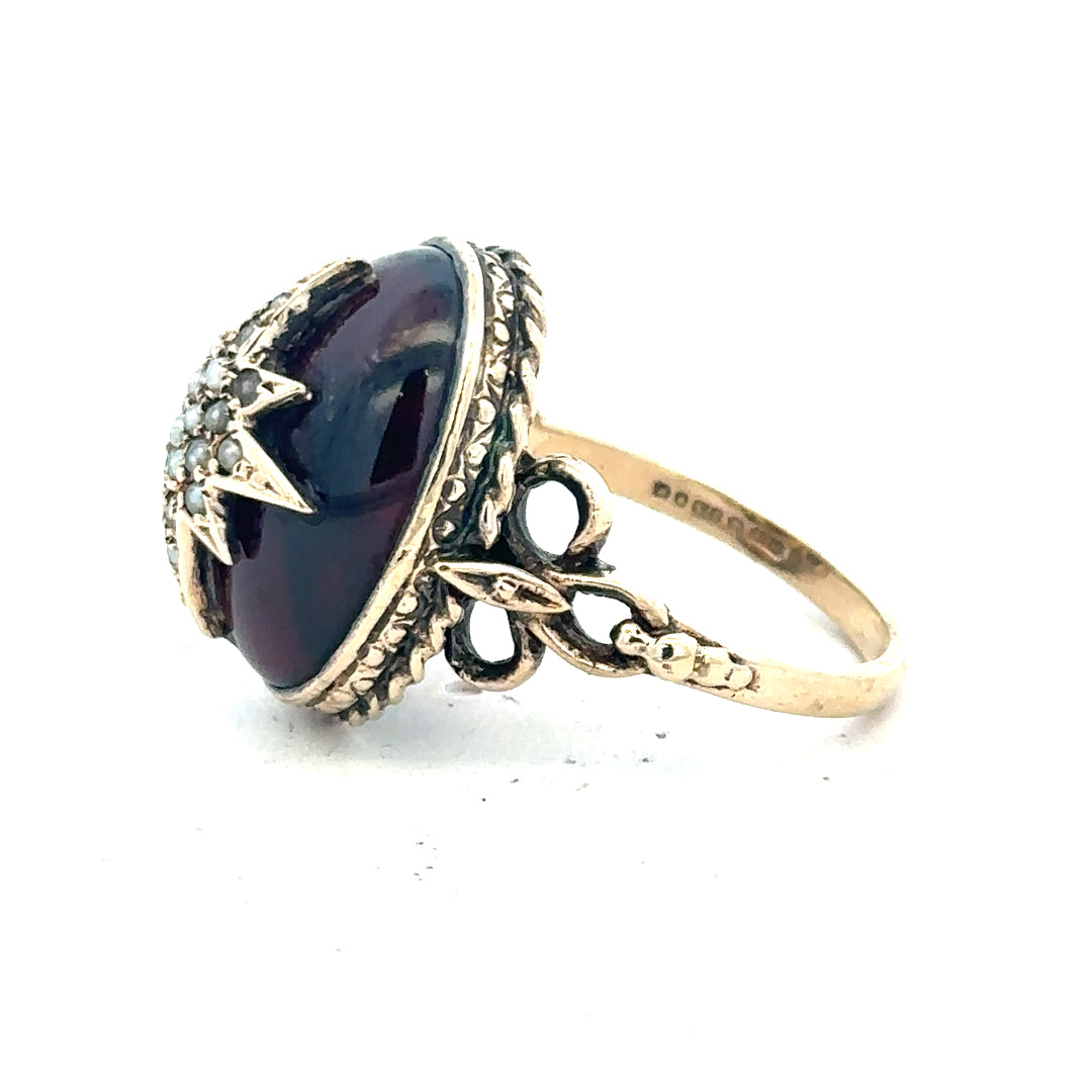 9ct yellow gold ring in size P with a smooth band, unbranded jewelry piece displayed on a plain background.