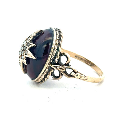 9ct yellow gold ring in size P with a smooth band, unbranded jewelry piece displayed on a plain background.