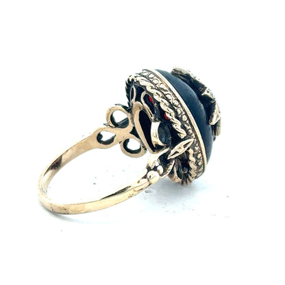 9ct yellow gold ring in size P with a smooth band, unbranded jewelry piece displayed against a neutral background.