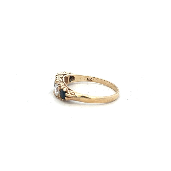 9ct yellow gold ring in size P with a smooth band, unbranded jewelry piece displayed on a neutral background.