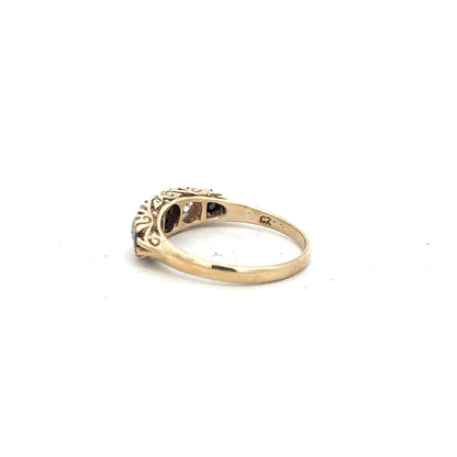 9ct yellow gold ring size P with smooth band, unbranded jewelry piece, shiny finish, close-up view of the ring.