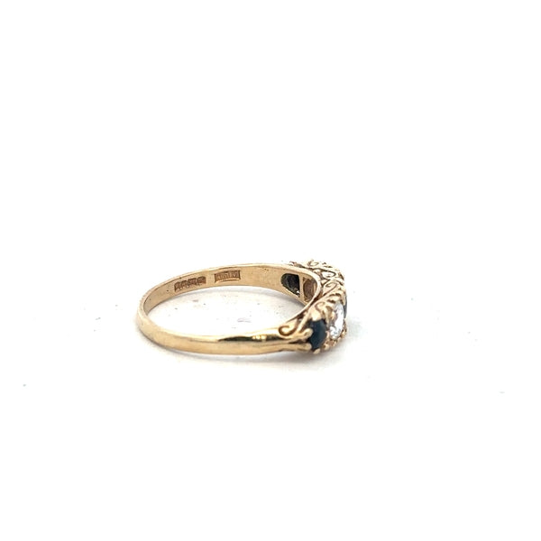 9ct yellow gold ring in size P with a smooth polished finish, unbranded jewelry piece.