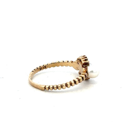 9ct yellow gold ring in size P with a smooth band design, unbranded jewelry piece.