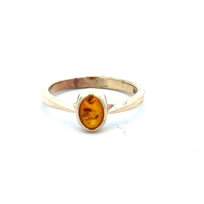 9ct yellow gold ring in size P, unbranded jewelry with a smooth band, shown in a detailed product image.