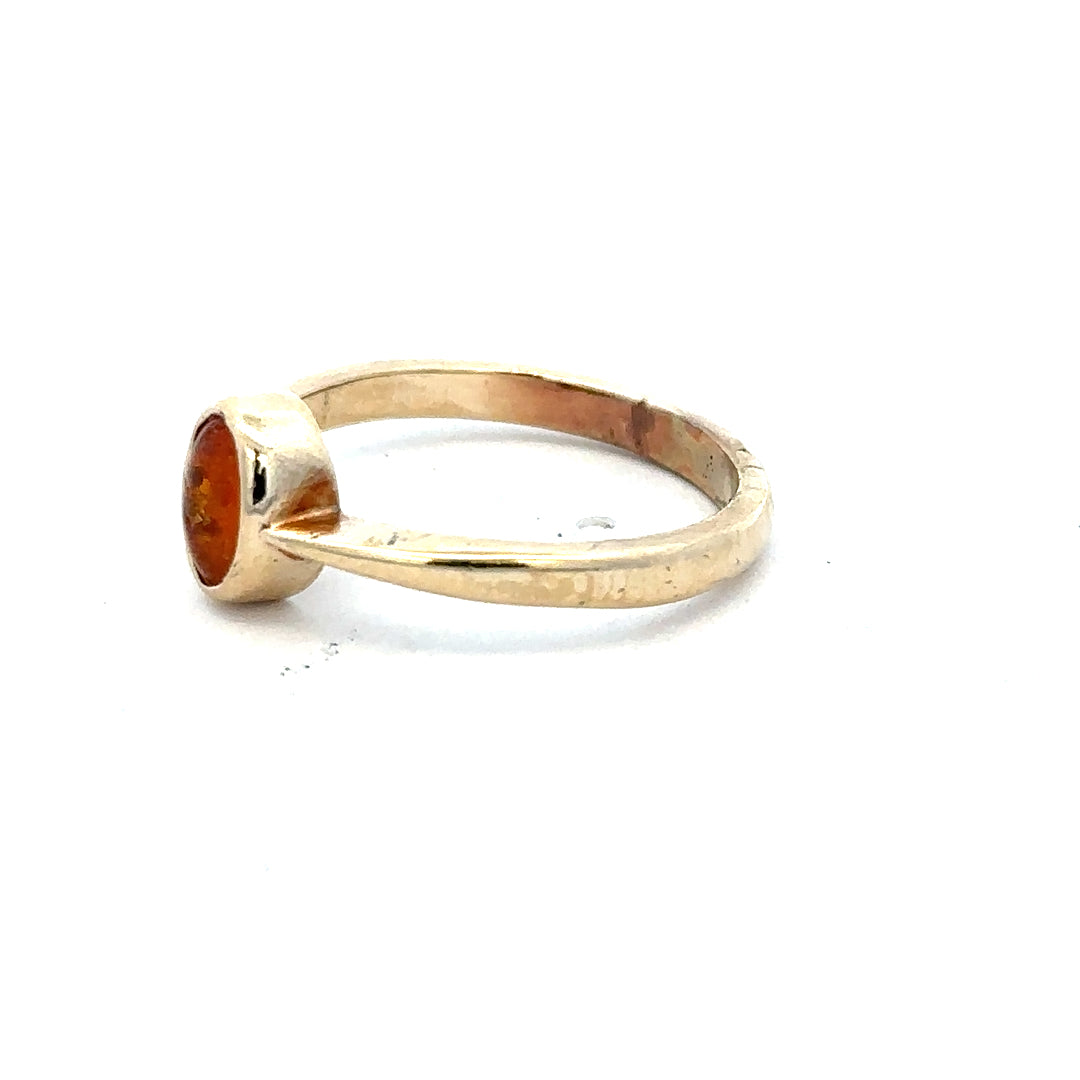 9ct yellow gold ring in size P with a smooth band, unbranded, shown on a plain background.