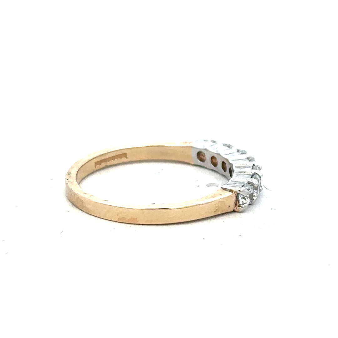 9ct yellow gold ring size P with a smooth polished finish, unbranded jewelry, shown in a close-up view.