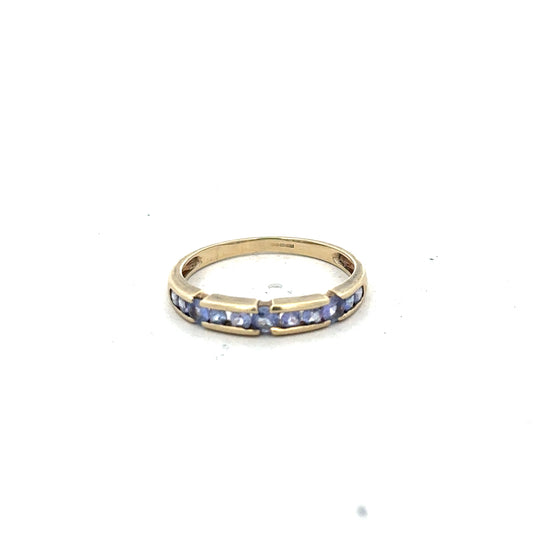 9ct yellow gold ring in size P with a smooth band, unbranded jewelry piece displayed against a neutral background.