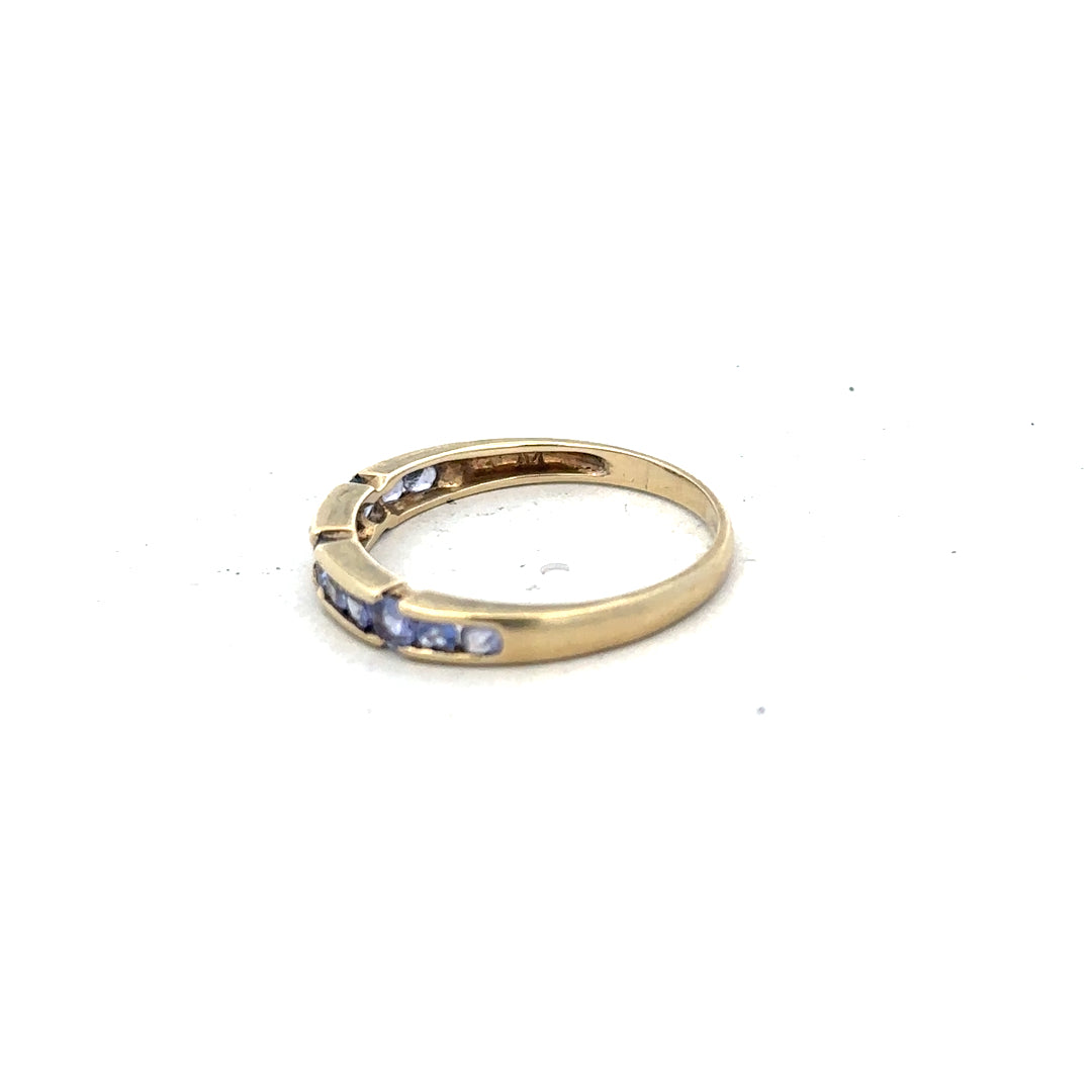 9ct yellow gold ring in size P, featuring a simple, elegant band with a polished finish.