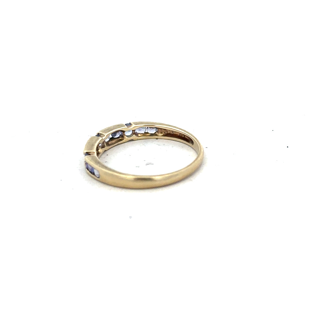 9ct yellow gold ring in size P with a smooth band, unbranded jewelry piece displayed on a plain background.